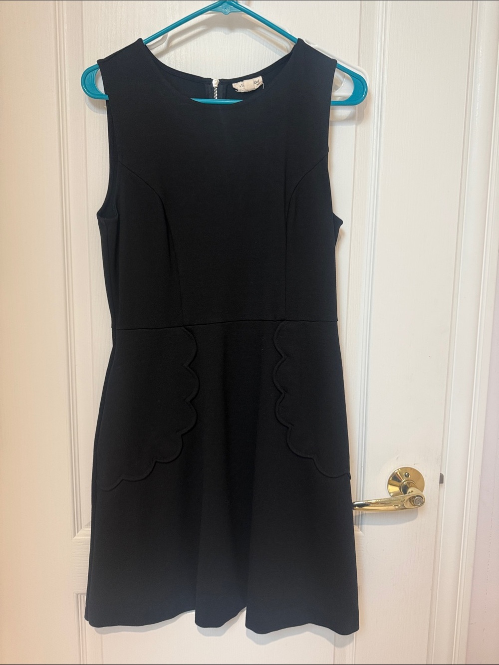 Classic Black Sleeveless Scallop Pocket Dress